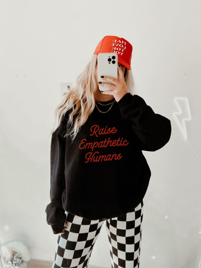 RAISE EMPATHETIC HUMANS CREWNECK