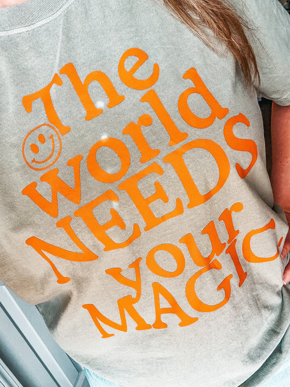 THE WORLD NEEDS YOUR MAGIC TEE